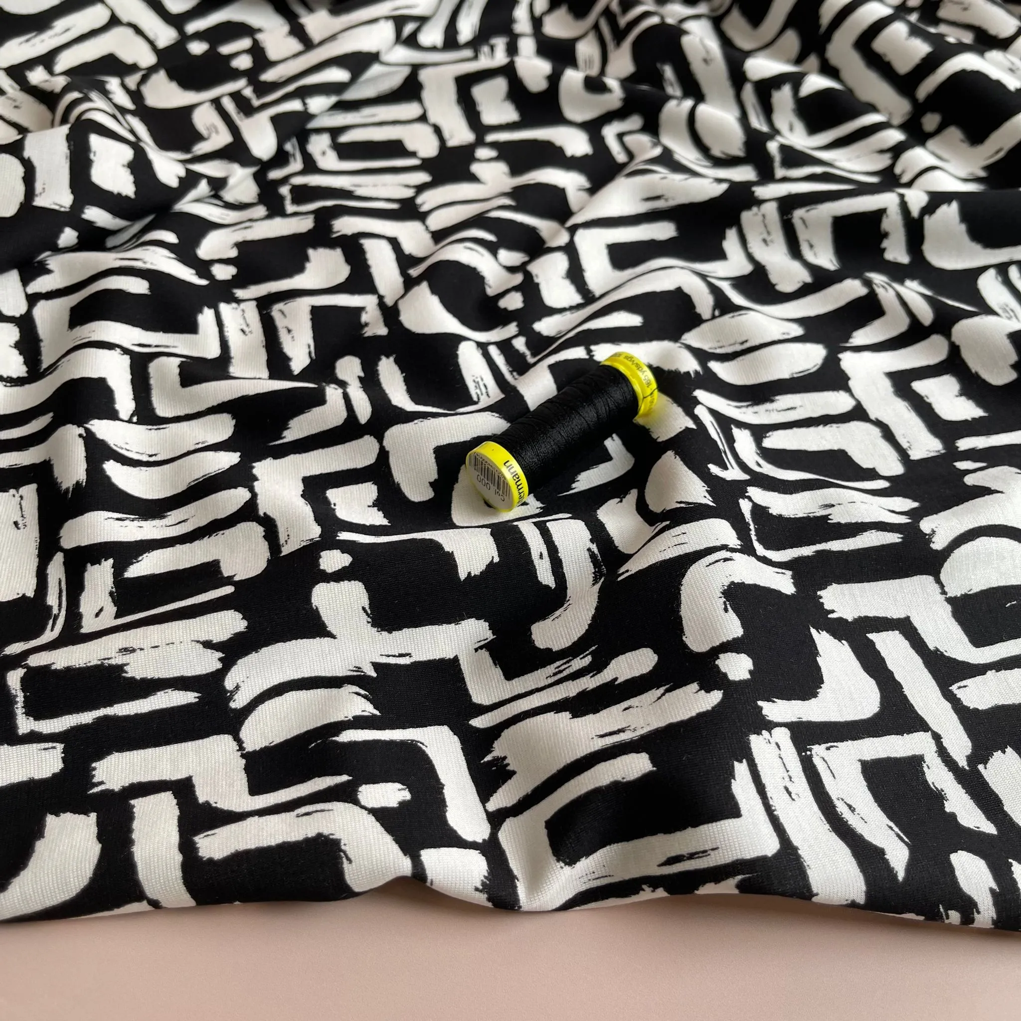 Plumming in Black and White Soft Ponte Roma Fabric