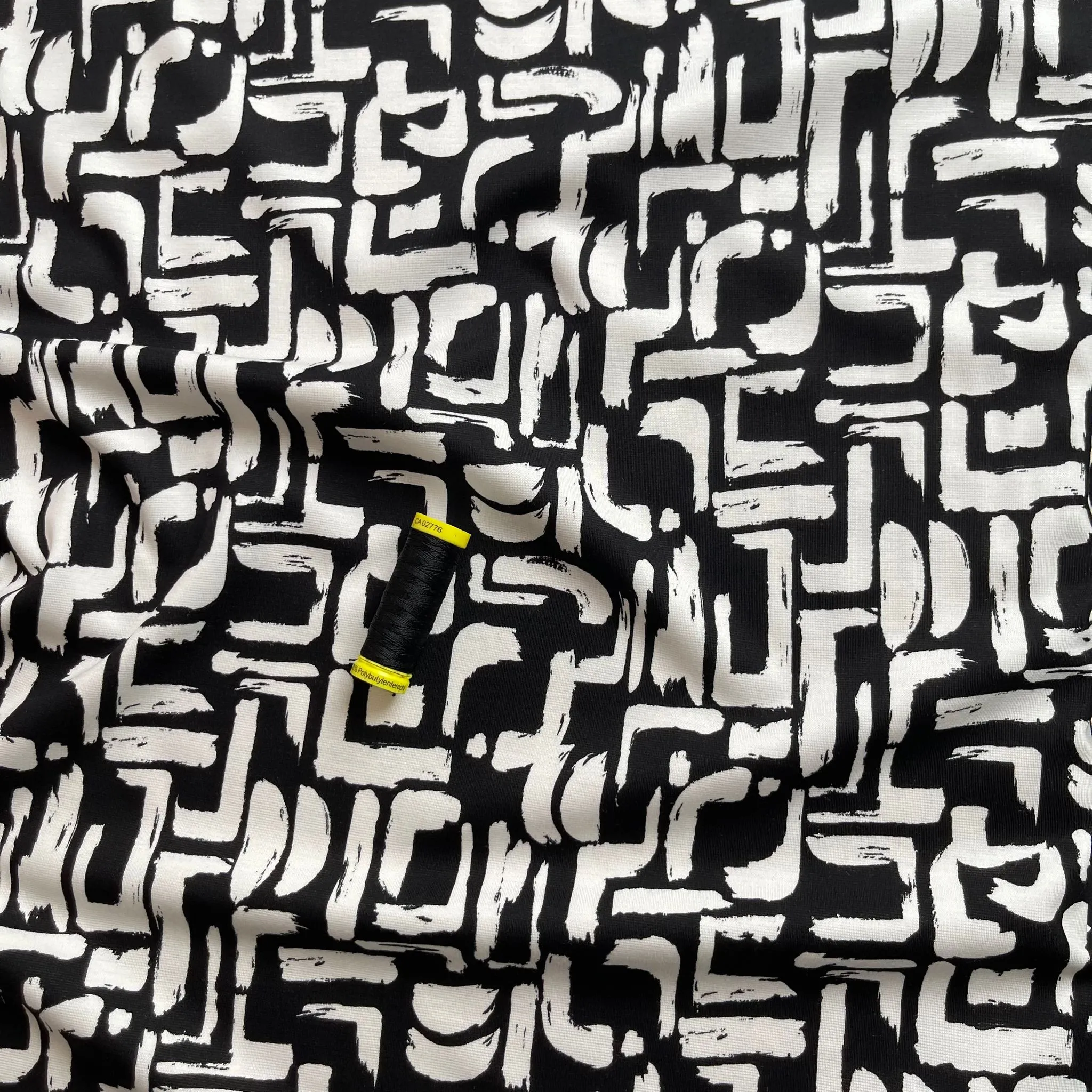 Plumming in Black and White Soft Ponte Roma Fabric